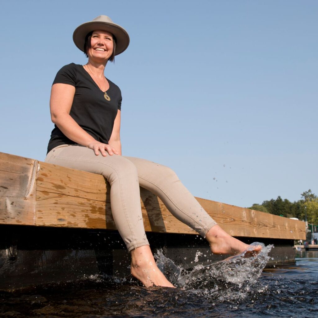 Andrea Parker on a dock